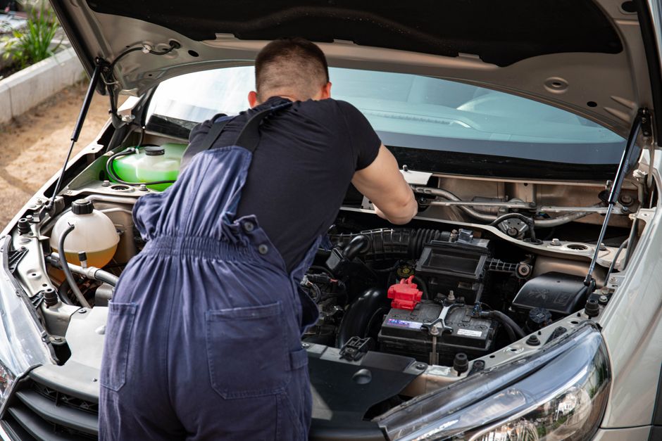 Friendly service technician providing heating and cooling advice